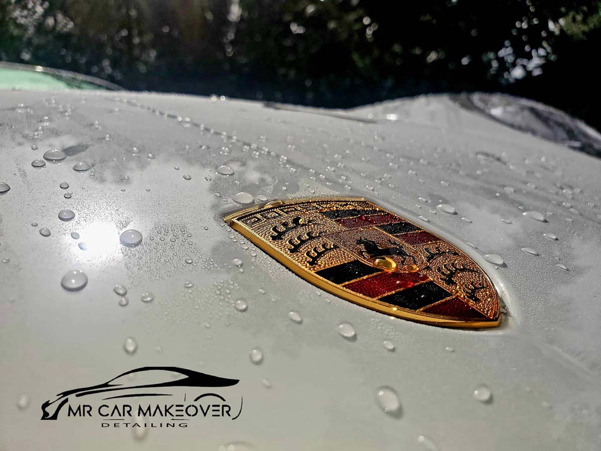  Beeds on the hood of a Porsche from the effect of a ceramic coating